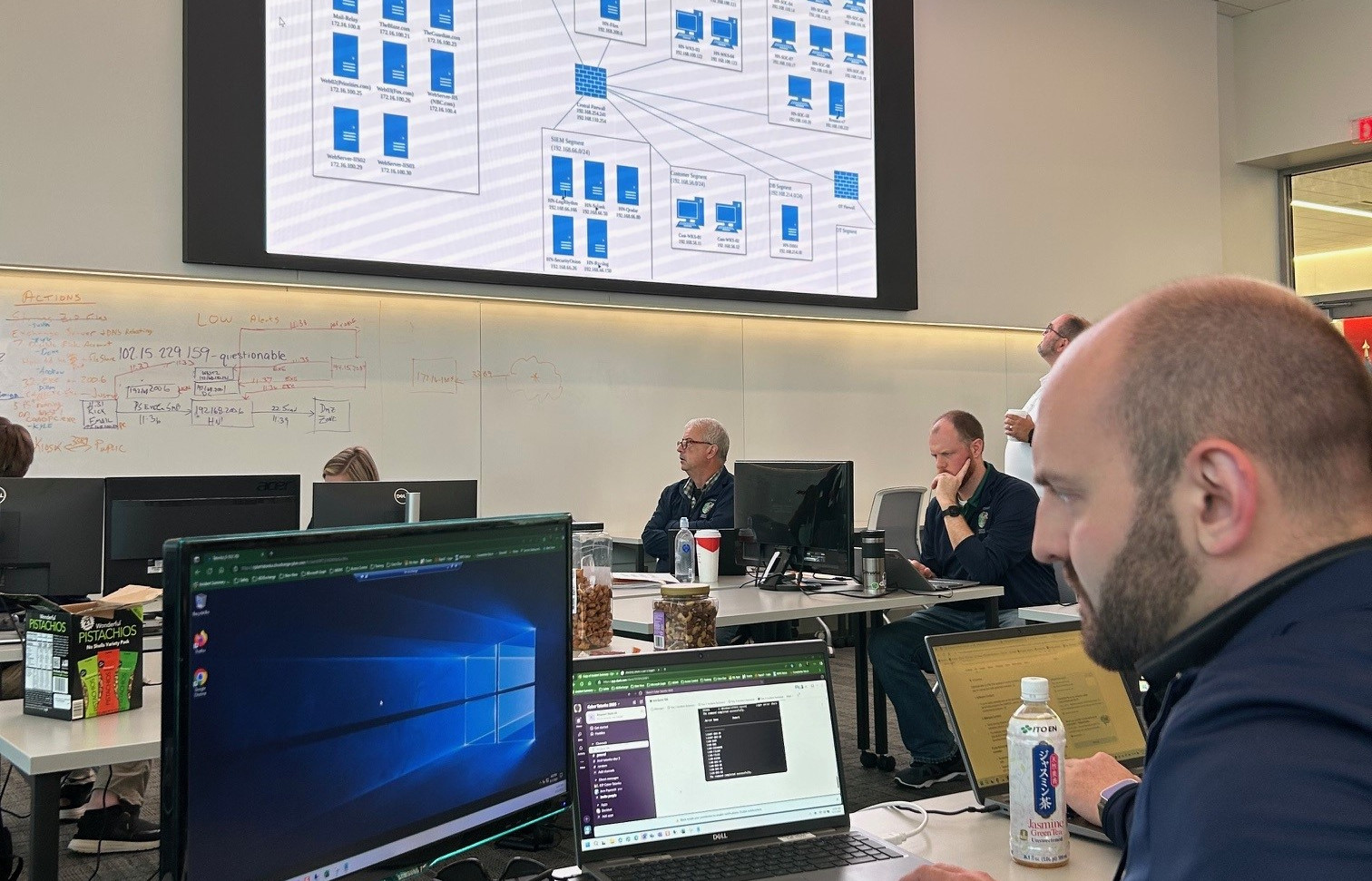 Participant Working in Virtual Training Environment with Network Diagram